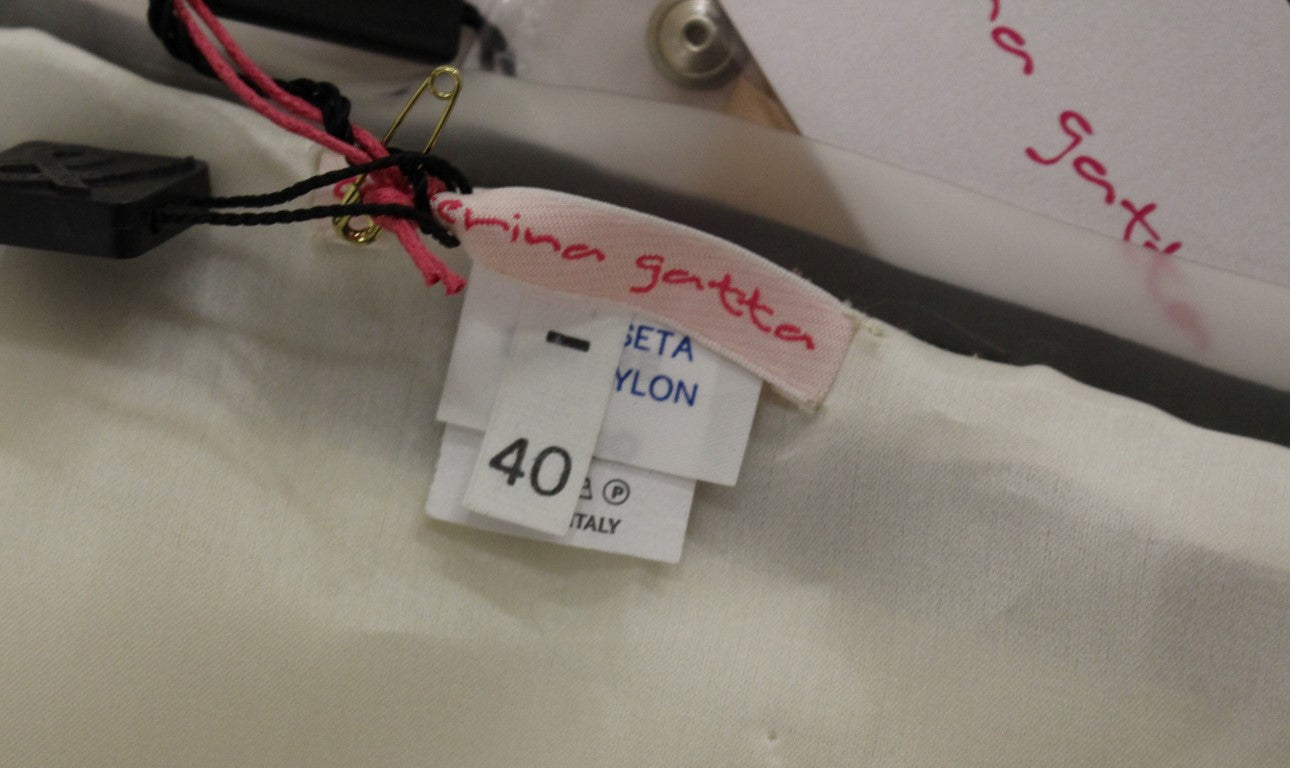 Caterina Gatta Beigefarbener Seidenminirock mit Blumendruck