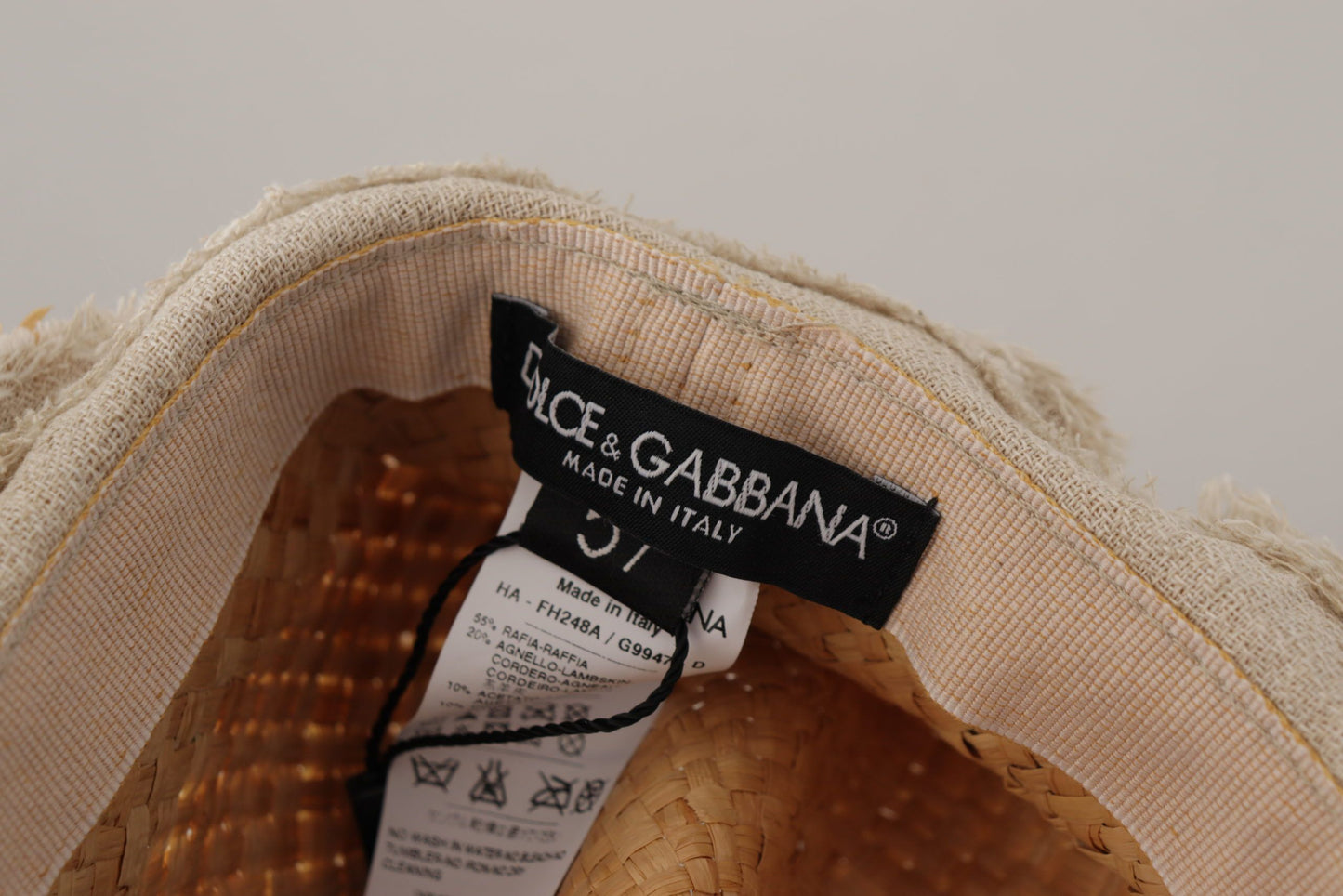 Dolce & Gabbana Strohhut mit gelber Schleife und Blumenverzierung