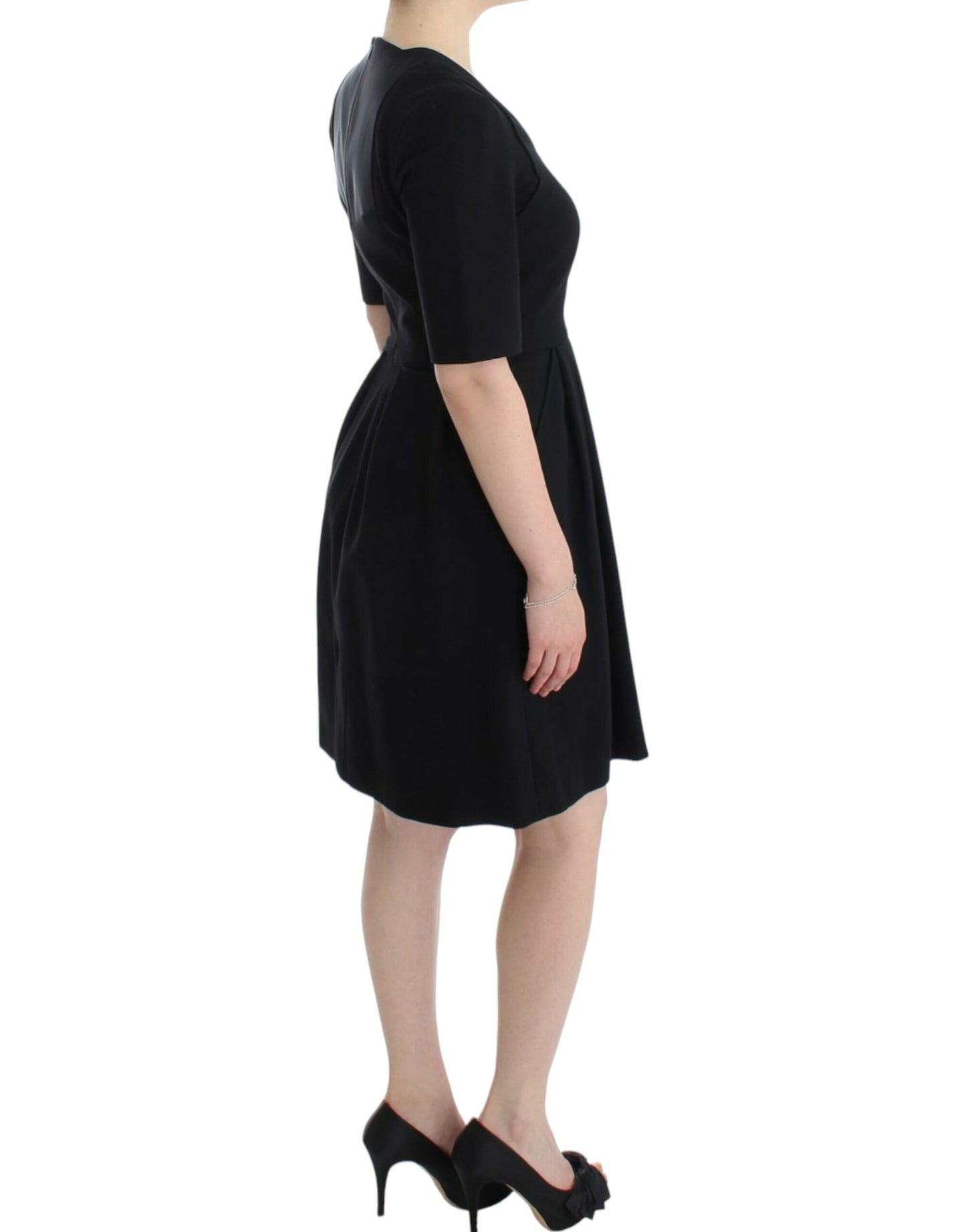 CO|TE Schwarzes kurzärmeliges Venuskleid
