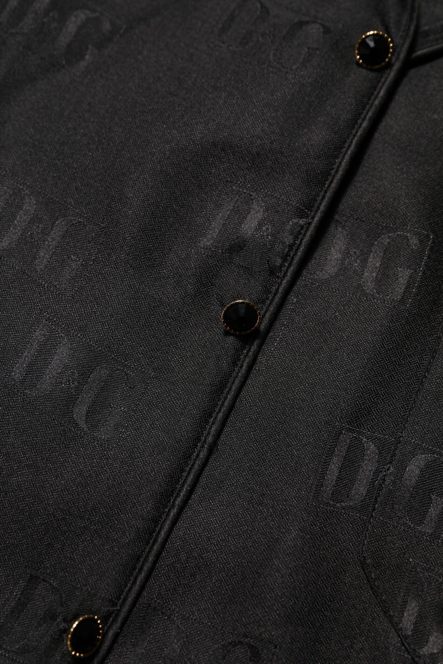 Dolce & Gabbana Schwarzes Seiden-DG besticktes langärmeliges Top