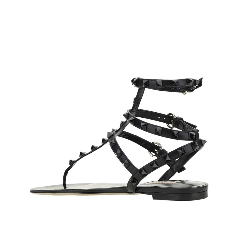 Valentino Garavani Flache Sandalen aus schwarzem Kalbsleder