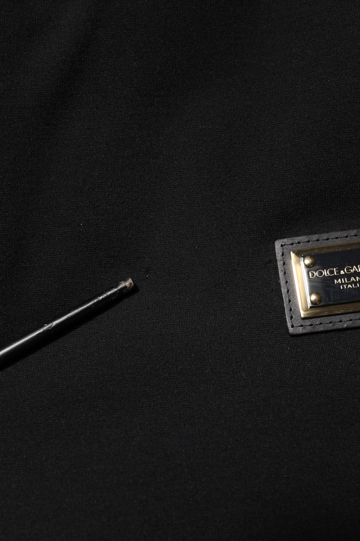 Dolce & Gabbana Schwarze ärmellose Jacke mit Kapuze und Logo-Plakette