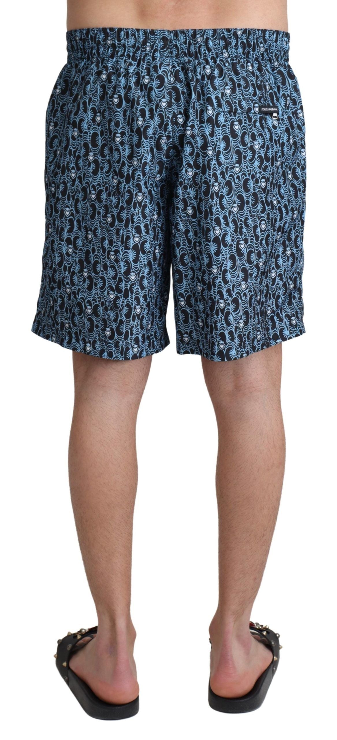Dolce & Gabbana Blaue gemusterte Strandbekleidung Shorts Bademode