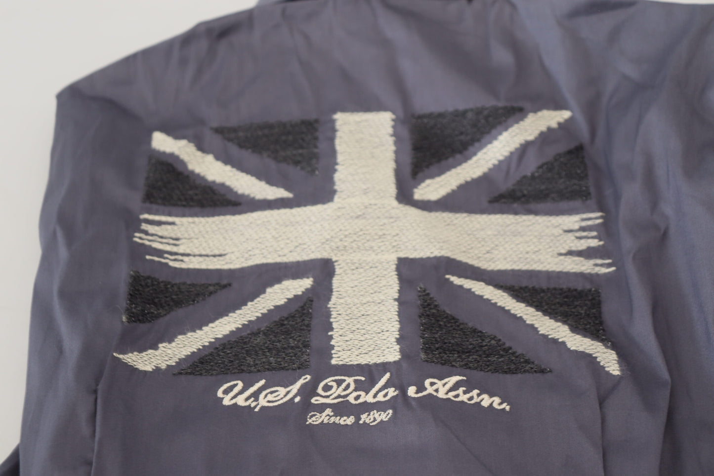 U.S. POLO ASSN. Graues bedrucktes Oberteil mit langen Ärmeln und Kragen