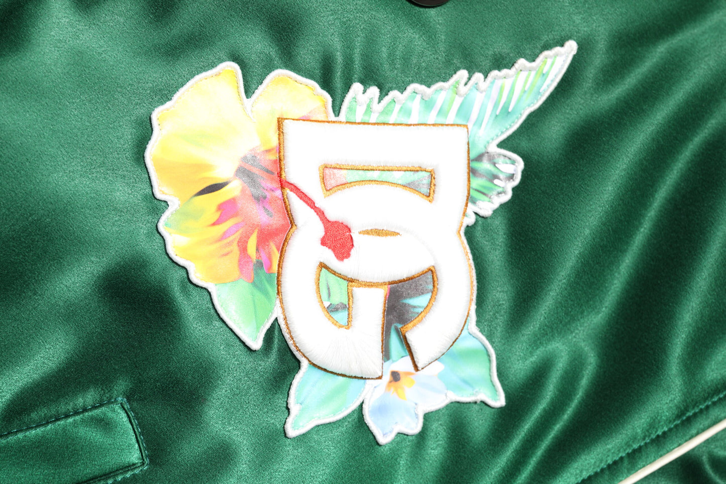 Dolce & Gabbana Grüne geblümte DG Logo Bomberjacke mit durchgehendem Reißverschluss