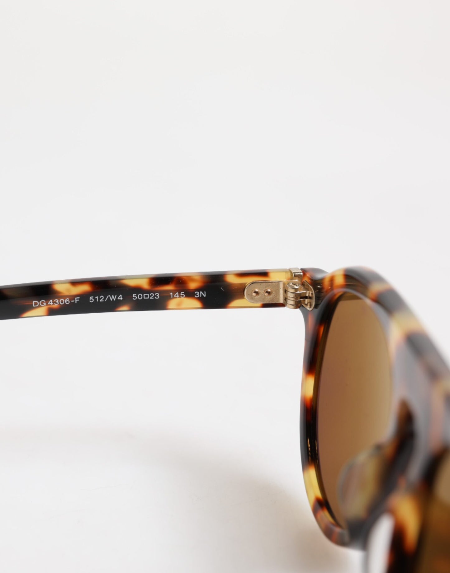 Dolce & Gabbana Braune Acetat-Sonnenbrille mit Leopardenmuster