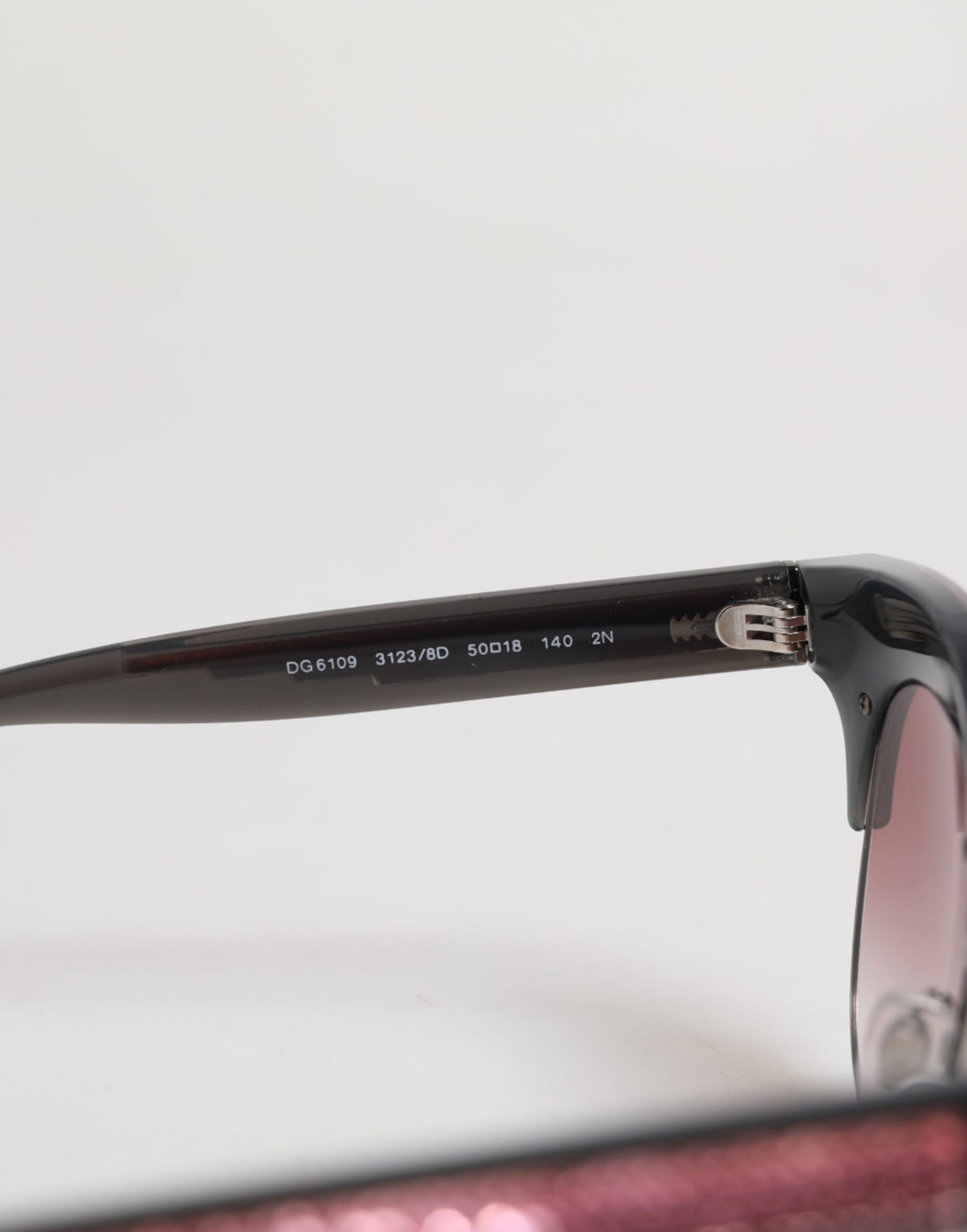 Dolce & Gabbana Schwarz rosa verspiegelte Cat Eye DG6109 Pailletten-Sonnenbrille