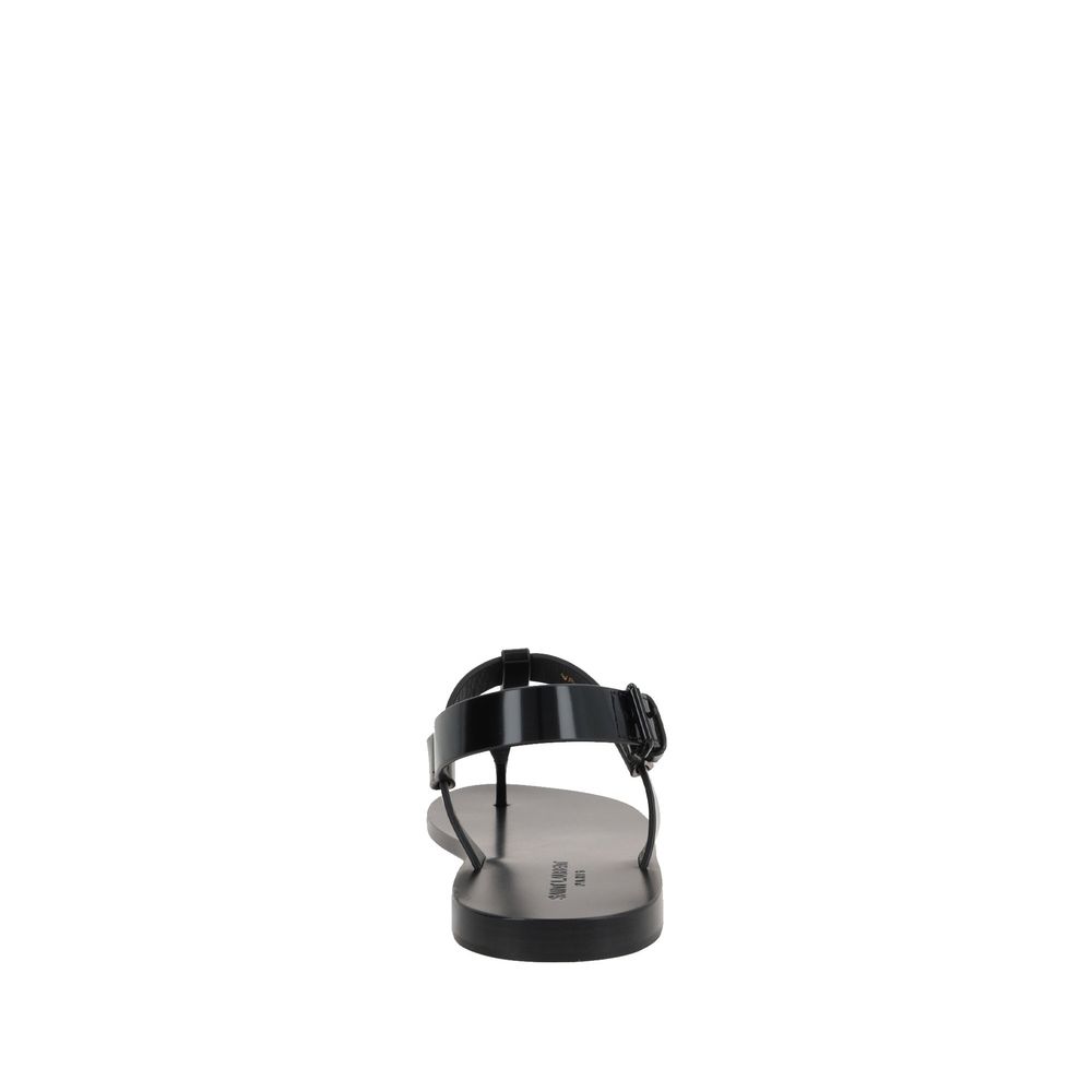 Saint Laurent Flache Sandalen aus schwarzem Kalbsleder