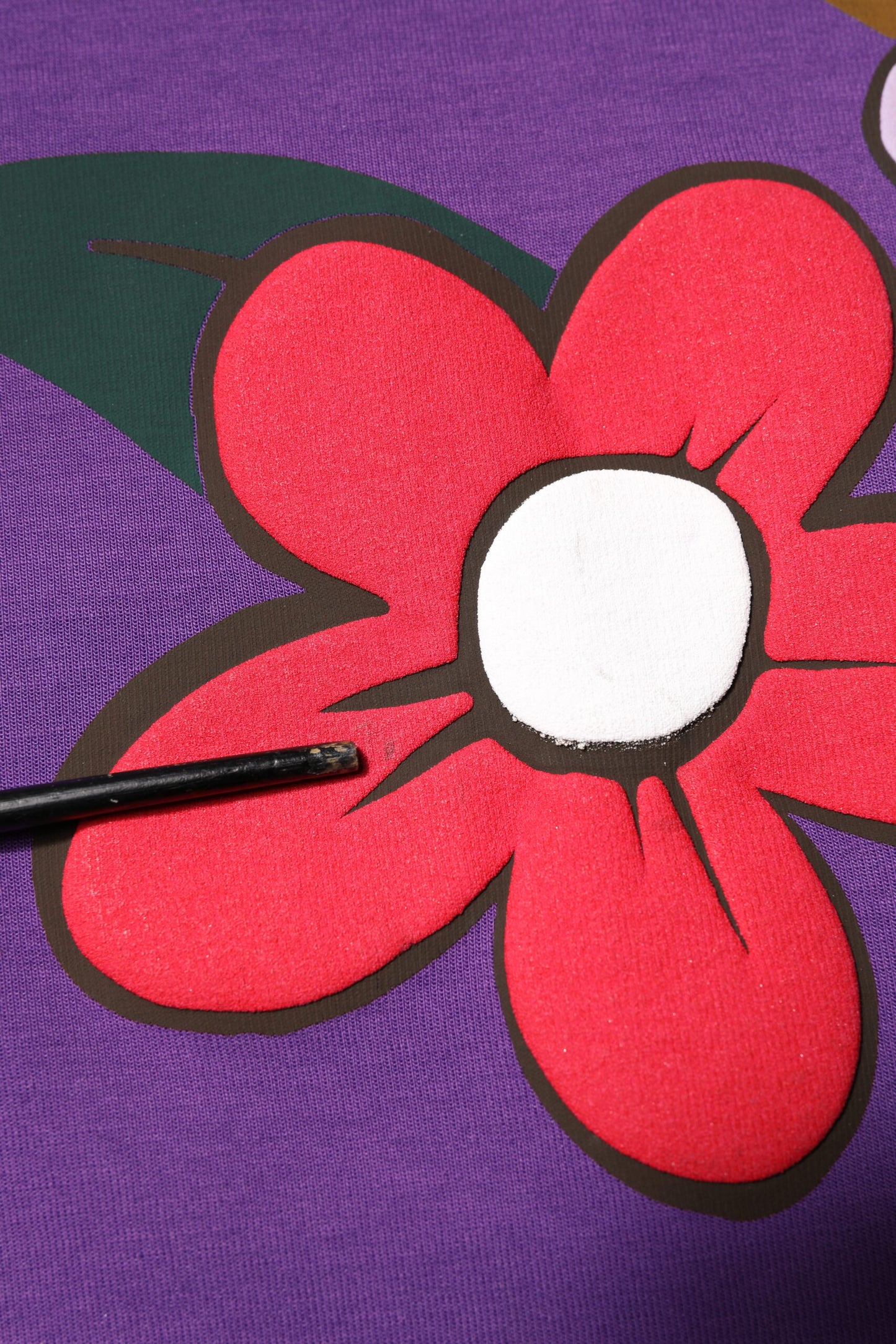 Dolce & Gabbana Langärmeliges Top aus Baumwolle mit lila Blumendruck