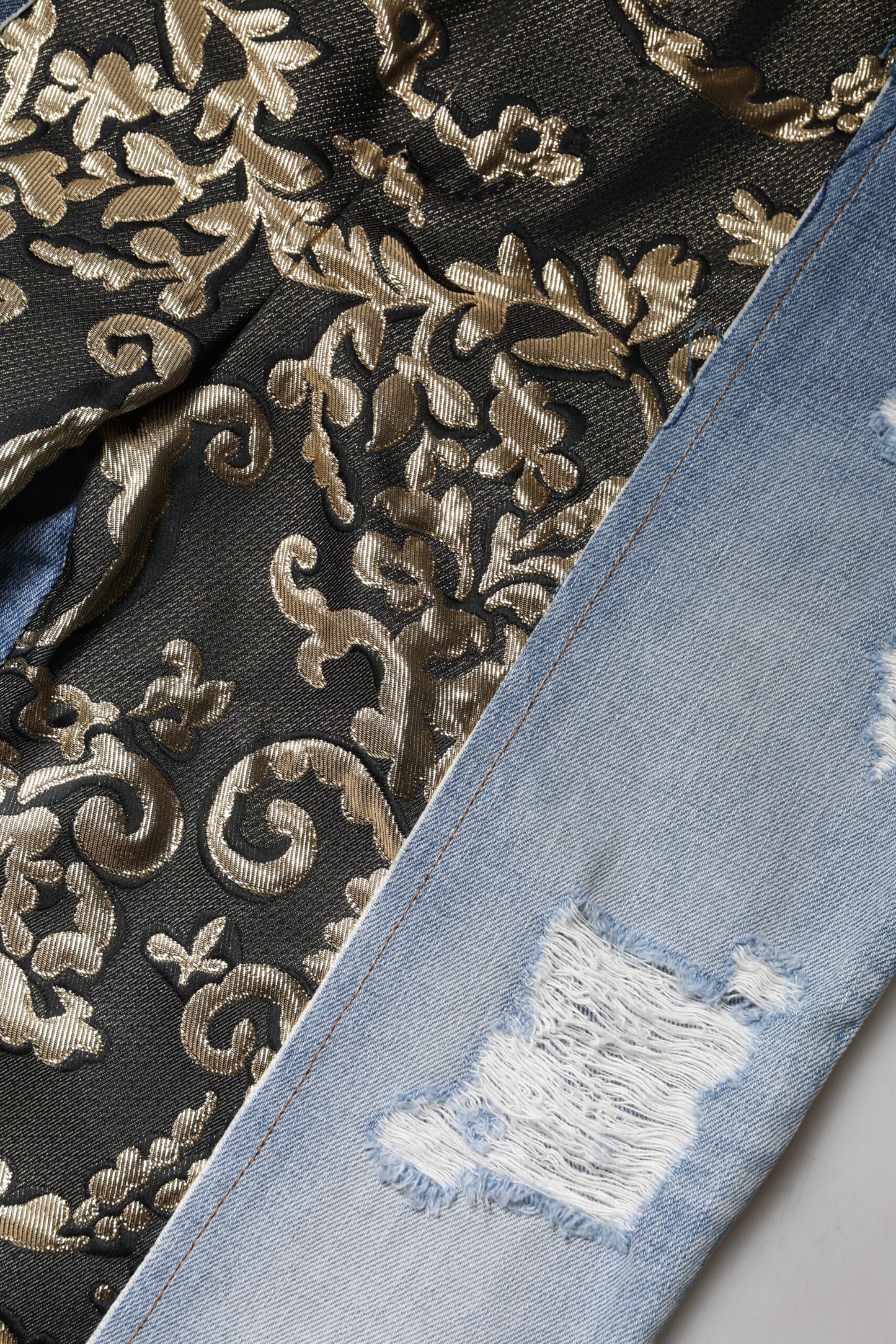 Dolce & Gabbana Mehrfarbige konisch zulaufende Denim-Jeans mit Patchwork