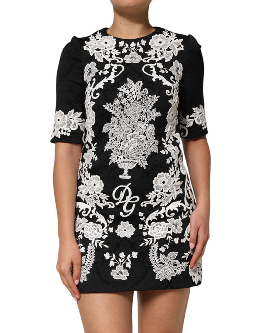 Dolce & Gabbana Schwarzes Kleid mit kurzen Ärmeln und Spitzenbesatz in A-Linie