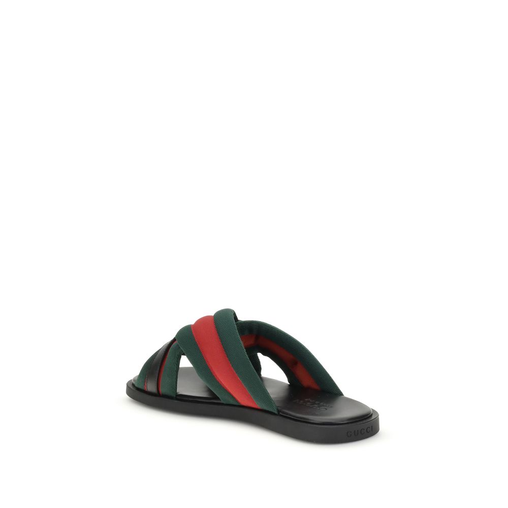 Gucci Stegsandalen mit ineinander greifendem GG