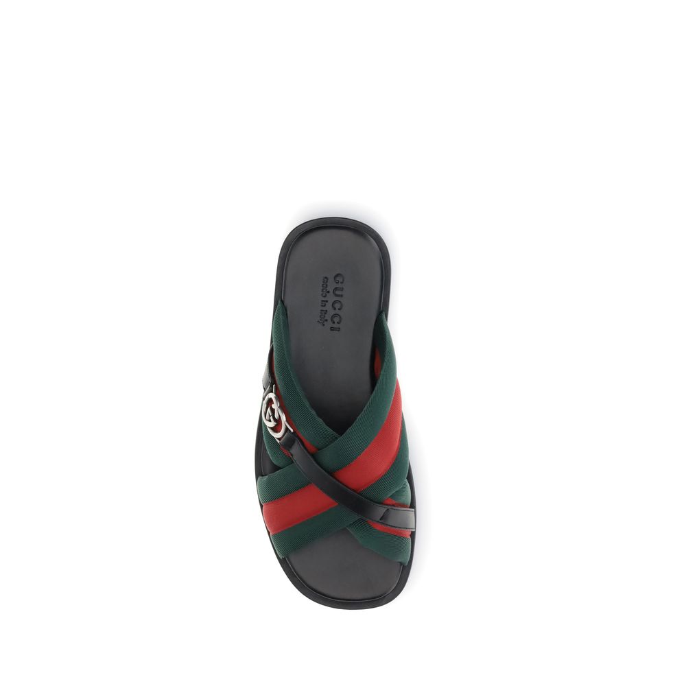 Gucci Stegsandalen mit ineinander greifendem GG